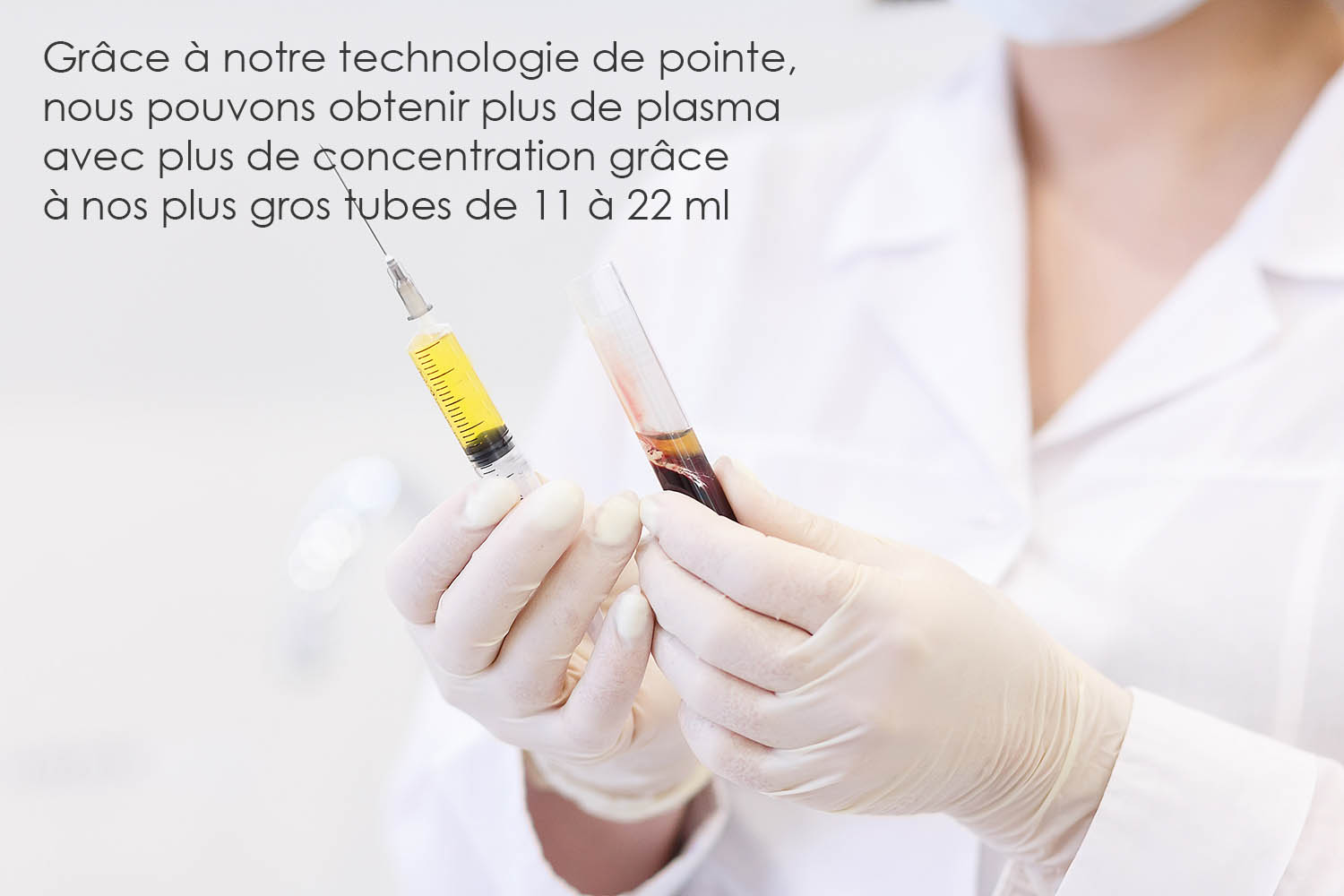 the uncertain doctor in medical gloves holds in hand syringe with plasma from test tube with blood the patient the uncertain doctor in medical gloves holds in hand syringe with plasma from test tube with blood the patient
